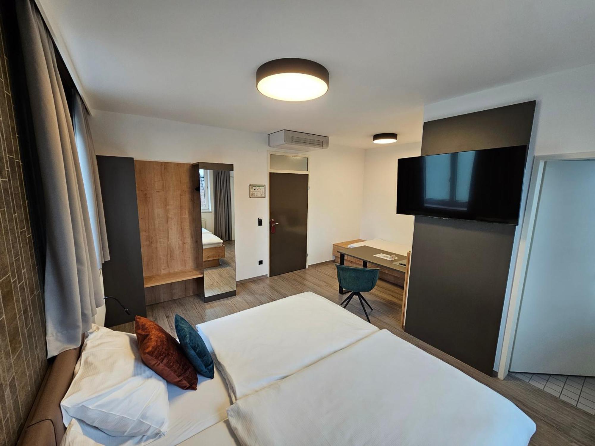 Dreibettzimmer