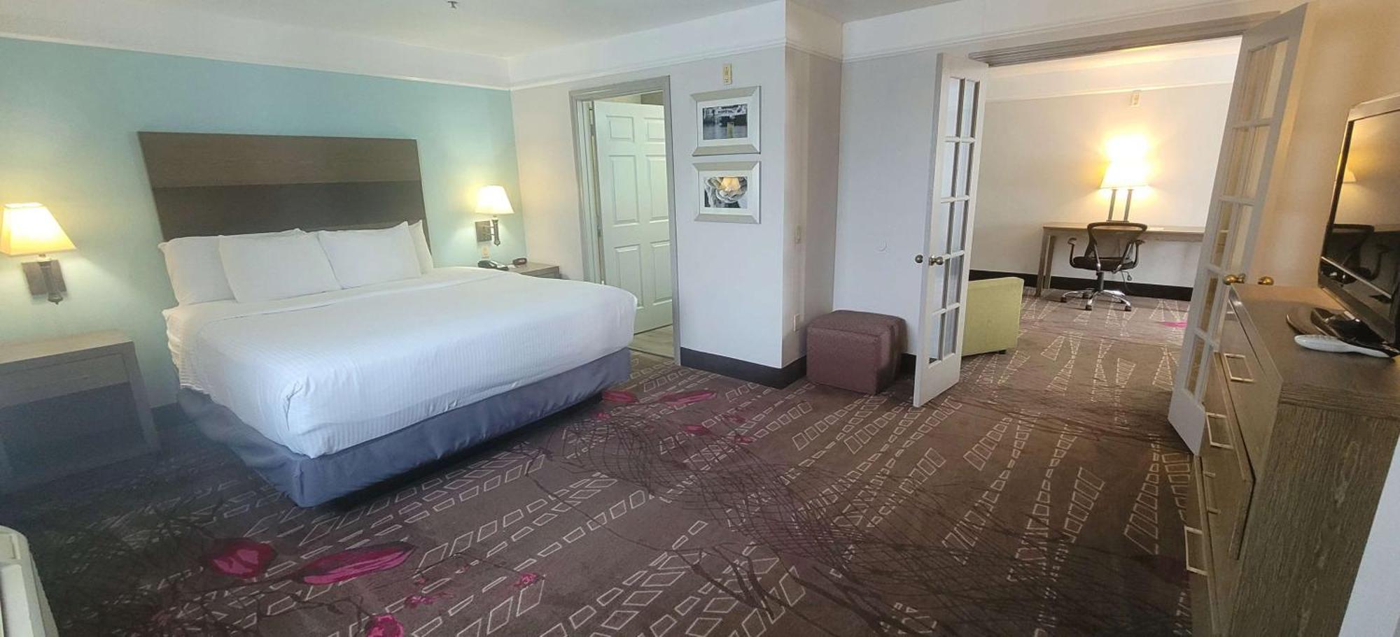 Two-Room Family Suite One King One Queen Bed Non-Smoking