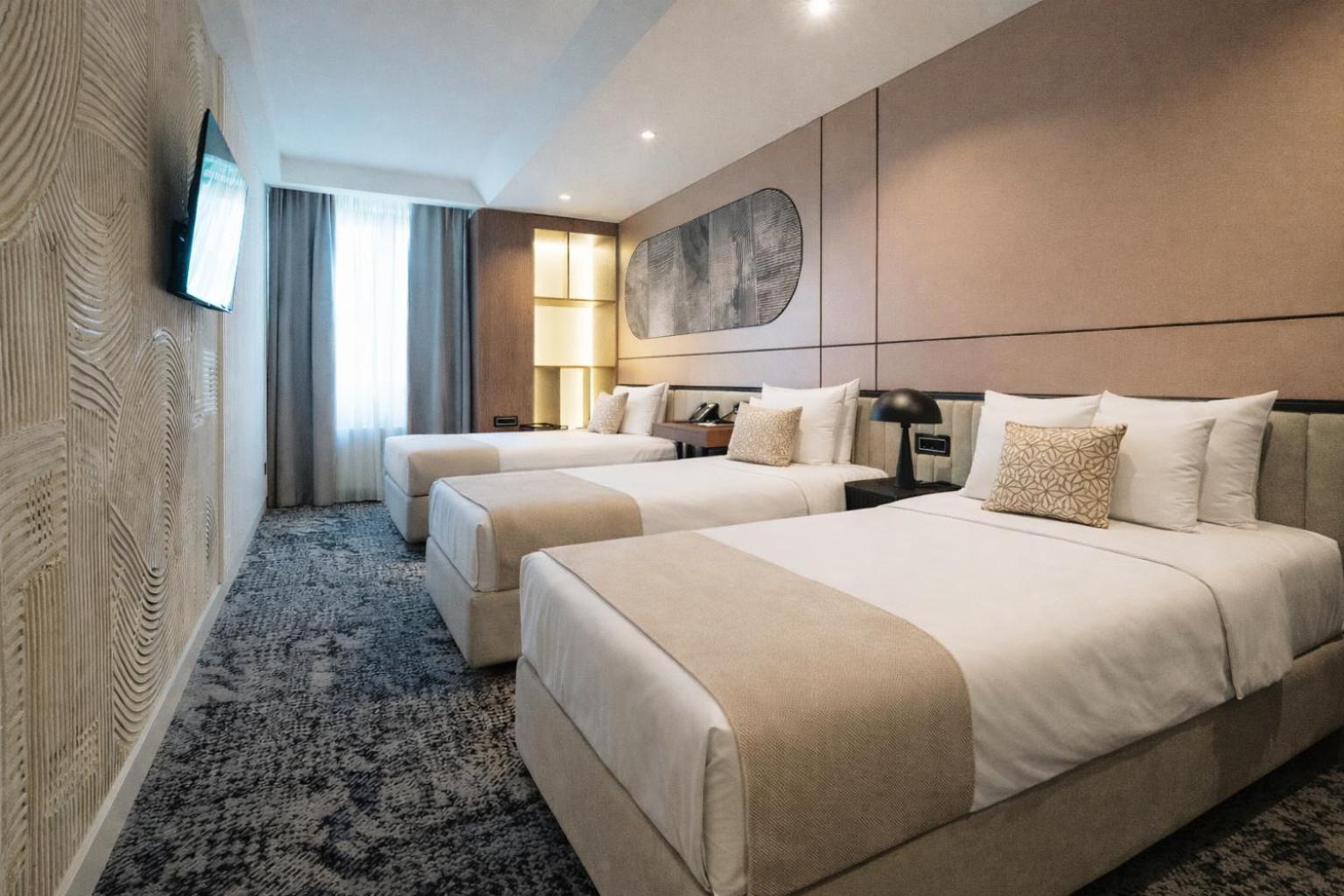 Deluxe Dreibettzimmer