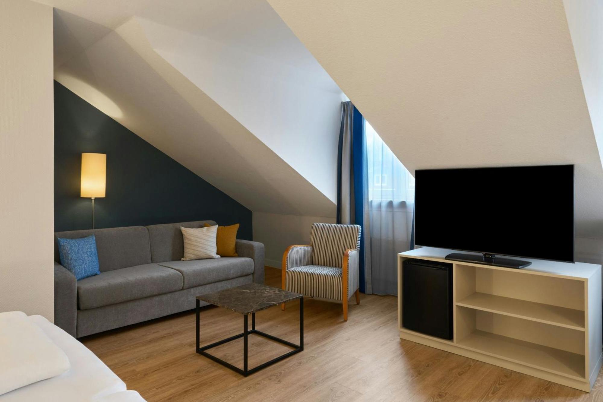 Standard-Familienzimmer mit zwei Einzelbetten und Schlafsofa