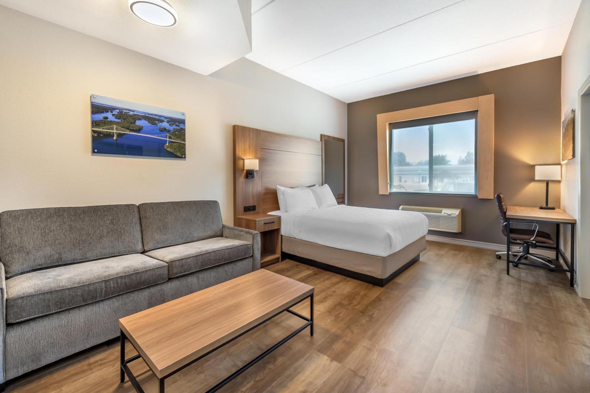 Family Suite with One King, One Queen Bed and Sofa Bed - Fireplace/Non-Smoking