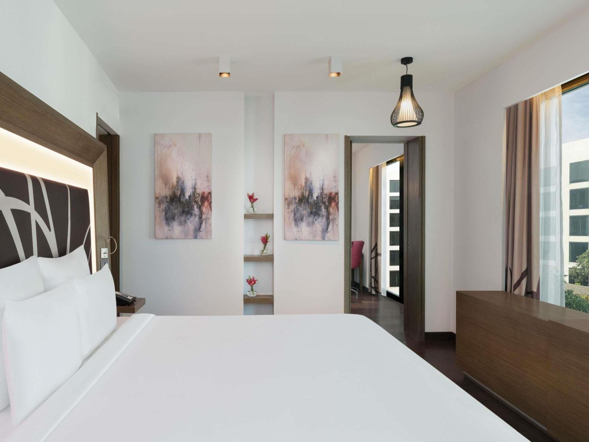 Superior Suite Pool View 2 Way Airport Transfers Lounge Access on F&B Laundry