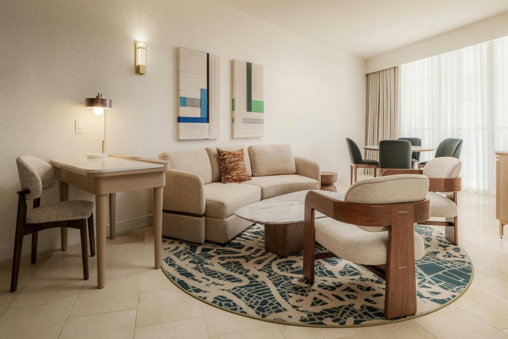 Executive suite king bed balcony partial ocean view
