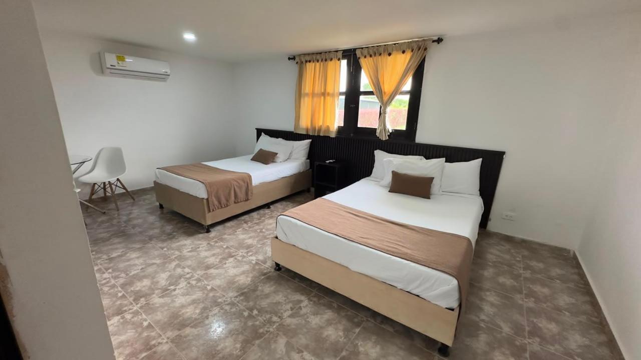 Habitación Cuádruple - vistas al jardín