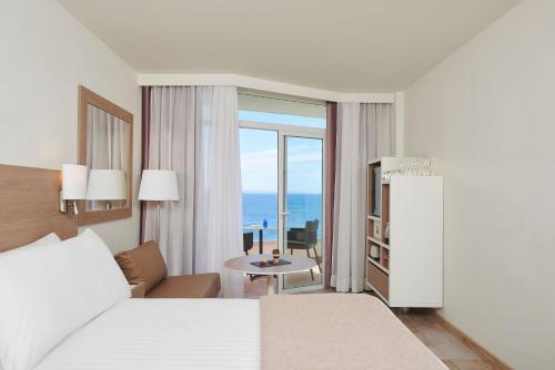 Quarto Melia com Vista Mar Lateral