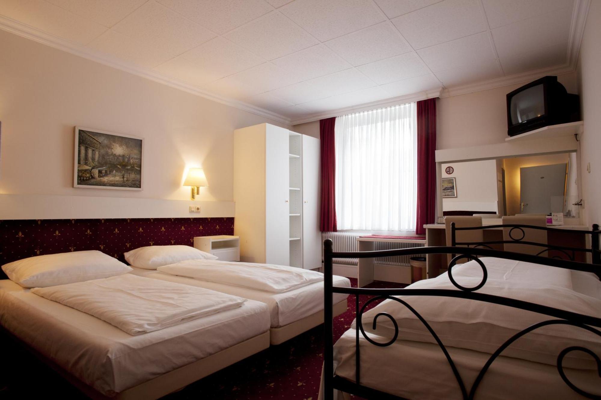 Dreibettzimmer