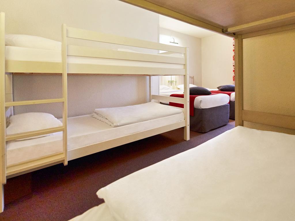 Quarto Standard com 2 Camas Individuais e 4 Beliches