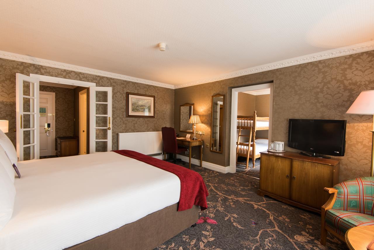 Classic Family Room with One King Bed and Bunk Bed
