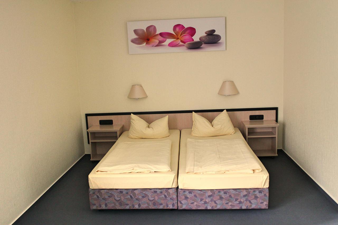 Doppel- oder Zweibettzimmer