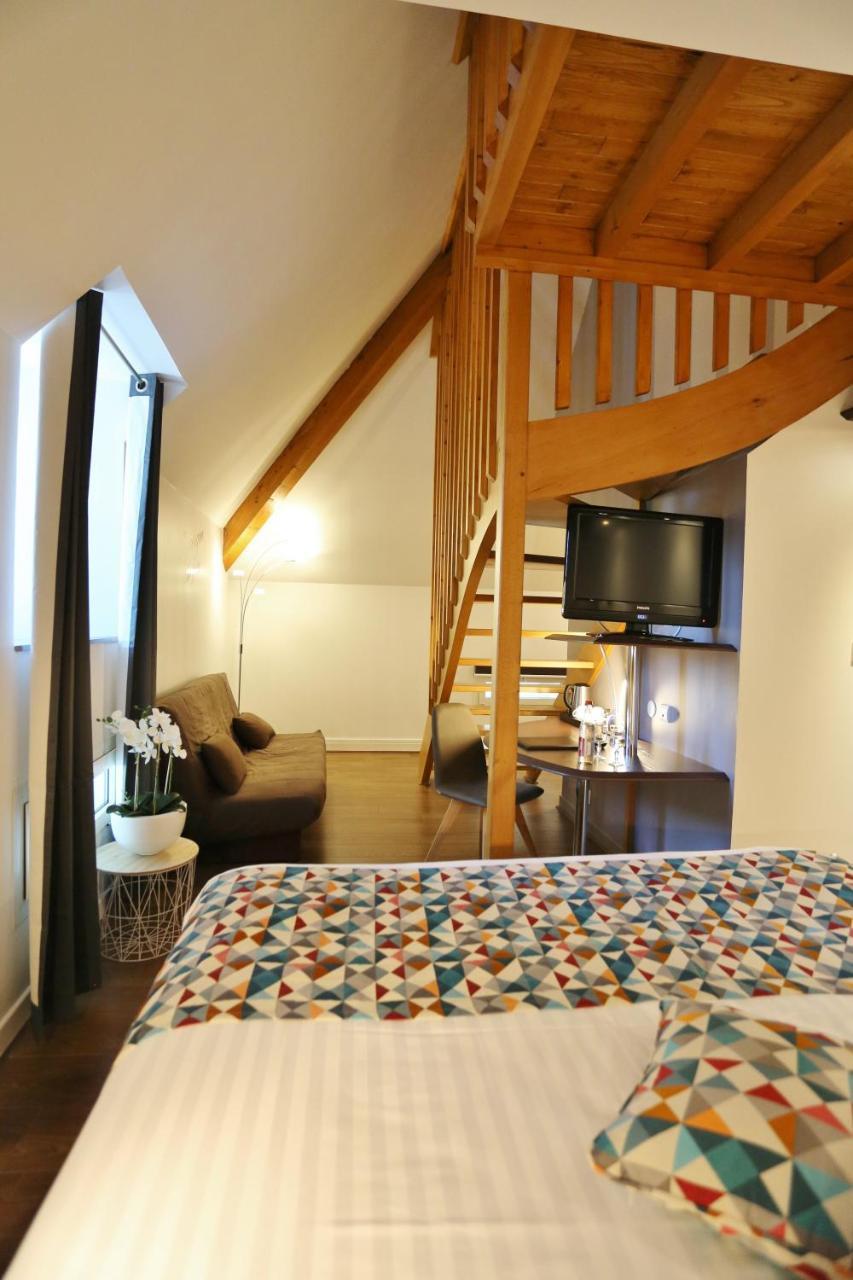 Chambre Quadruple Deluxe avec Lit Queen-Size et Cuisine