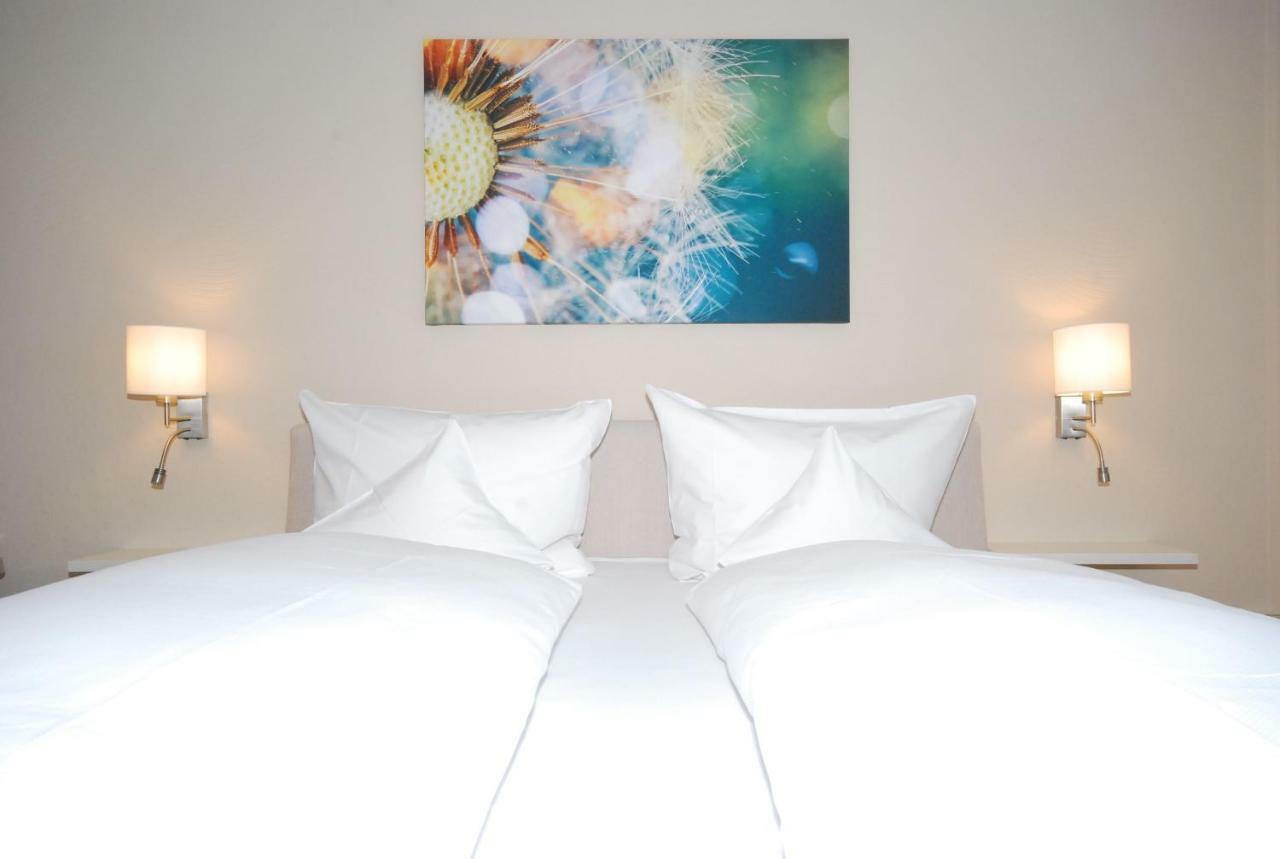Dreibettzimmer mit Balkon
