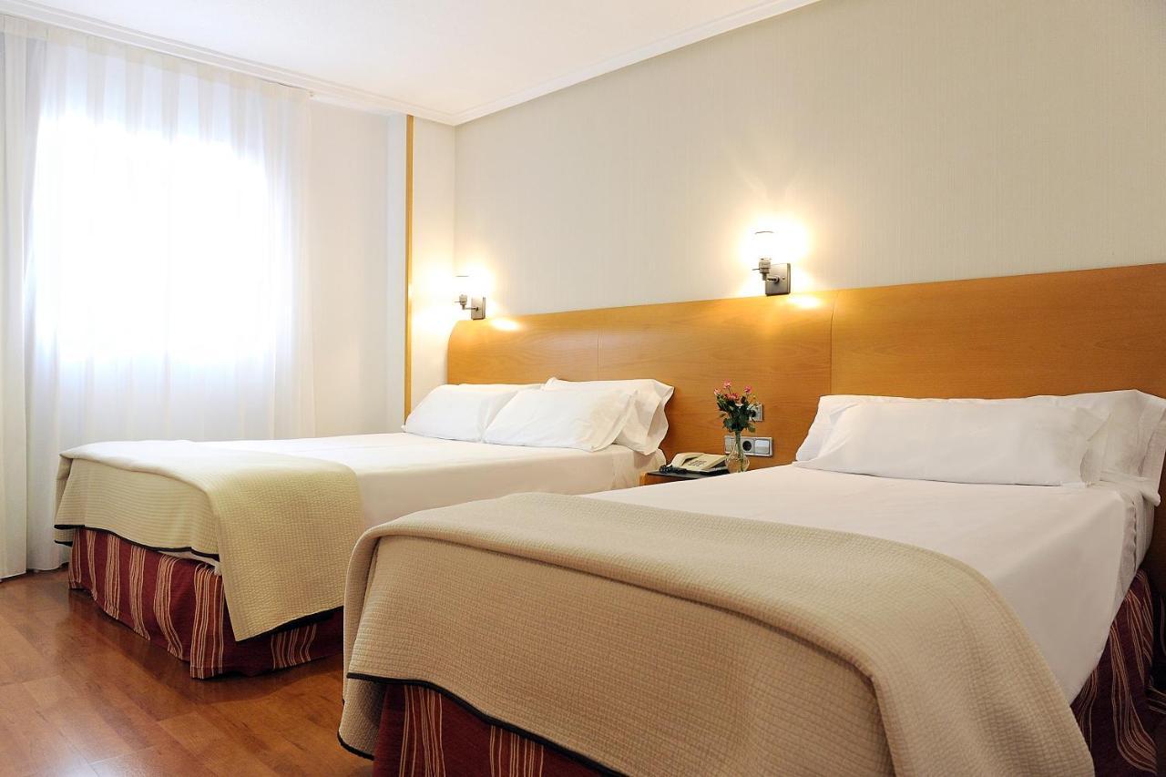 Camera Matrimoniale con Letto Supplementare