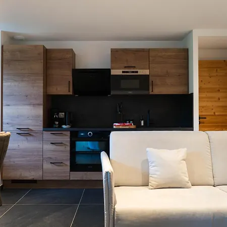 Géraniums Et Neige Fraîche, maison comtoise avec suites appartements de prestige, chambre tout confort, certaines avec spa et sauna privatifs au cœur du Jura à Métabief dans le Haut-Doubs-3