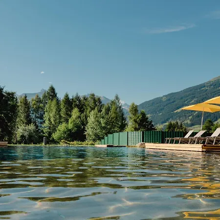 Hotel Norica - Thermenhotels Gastein mit dem Bademantel direkt in die Therme-3