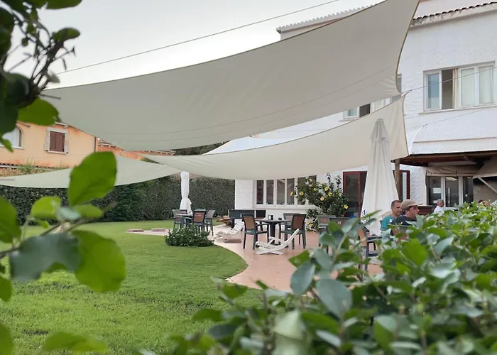HOTEL Al FARO , SPIAGGIA LA CINTA ,SAN TEODORO