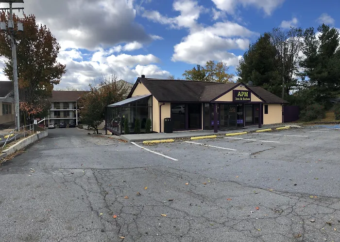 Apm Inn And Suites