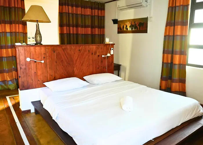 Villa Alizée Boutique Hotel - Idéal Couples&Pros - Rooftop - Parking privé - 10min Port-Louis