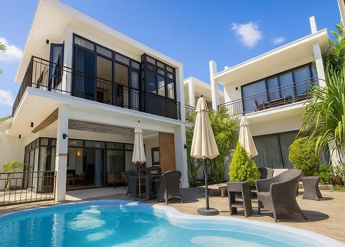 Villa Alizée Boutique Hotel - Idéal Couples&Pros - Rooftop - Parking privé - 10min Port-Louis