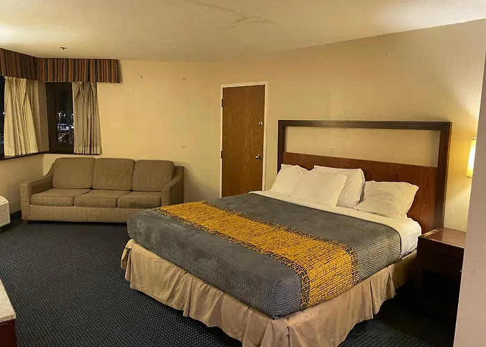 Apm Inn & Suites
